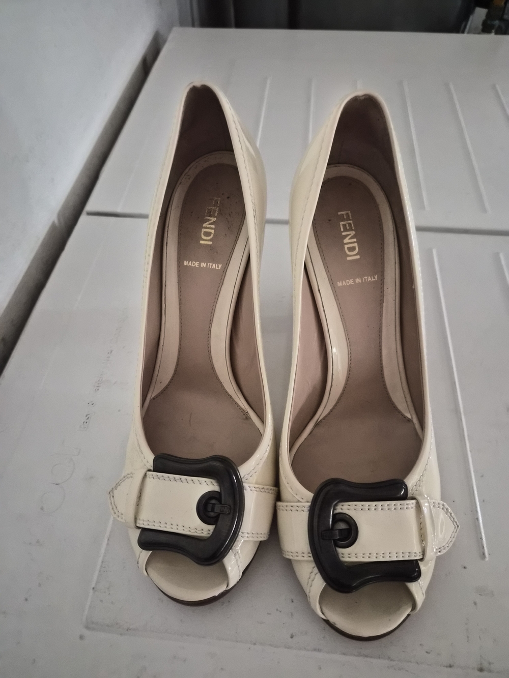 Fendi Cream Peep-Toe Pumps with Black Buckle Accent